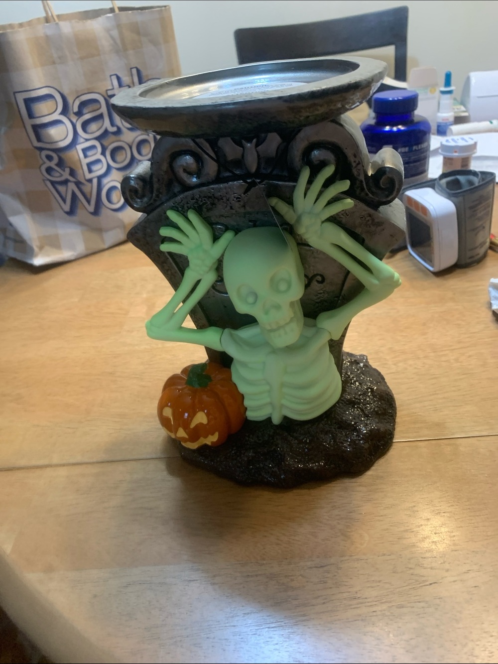 Candle holder. At office